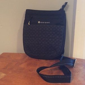 Sherpani black over the shoulder bag